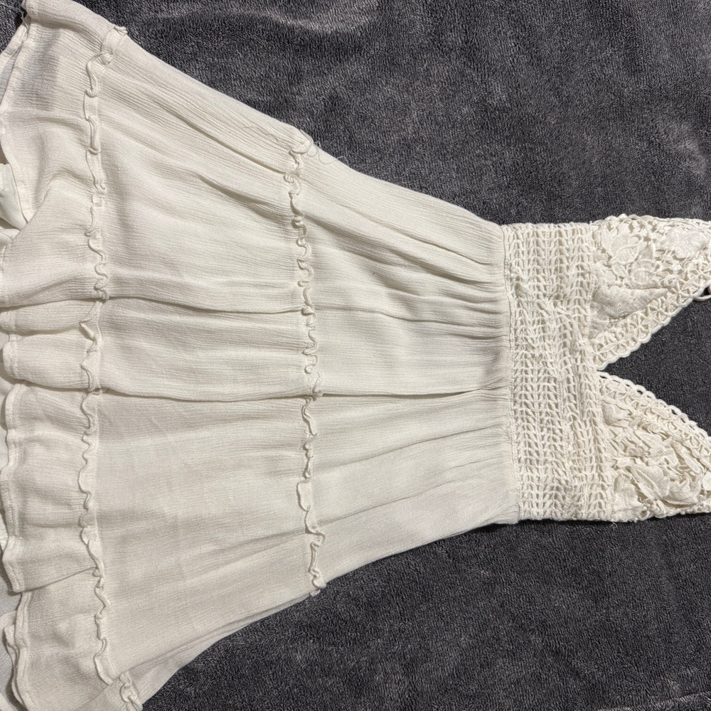 Cream strap dress with a tie back
